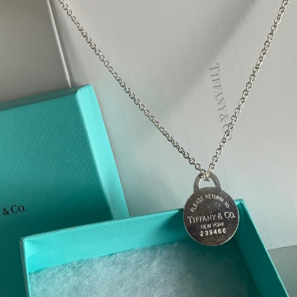 Authentic Tiffany chain and X-Large round tag.